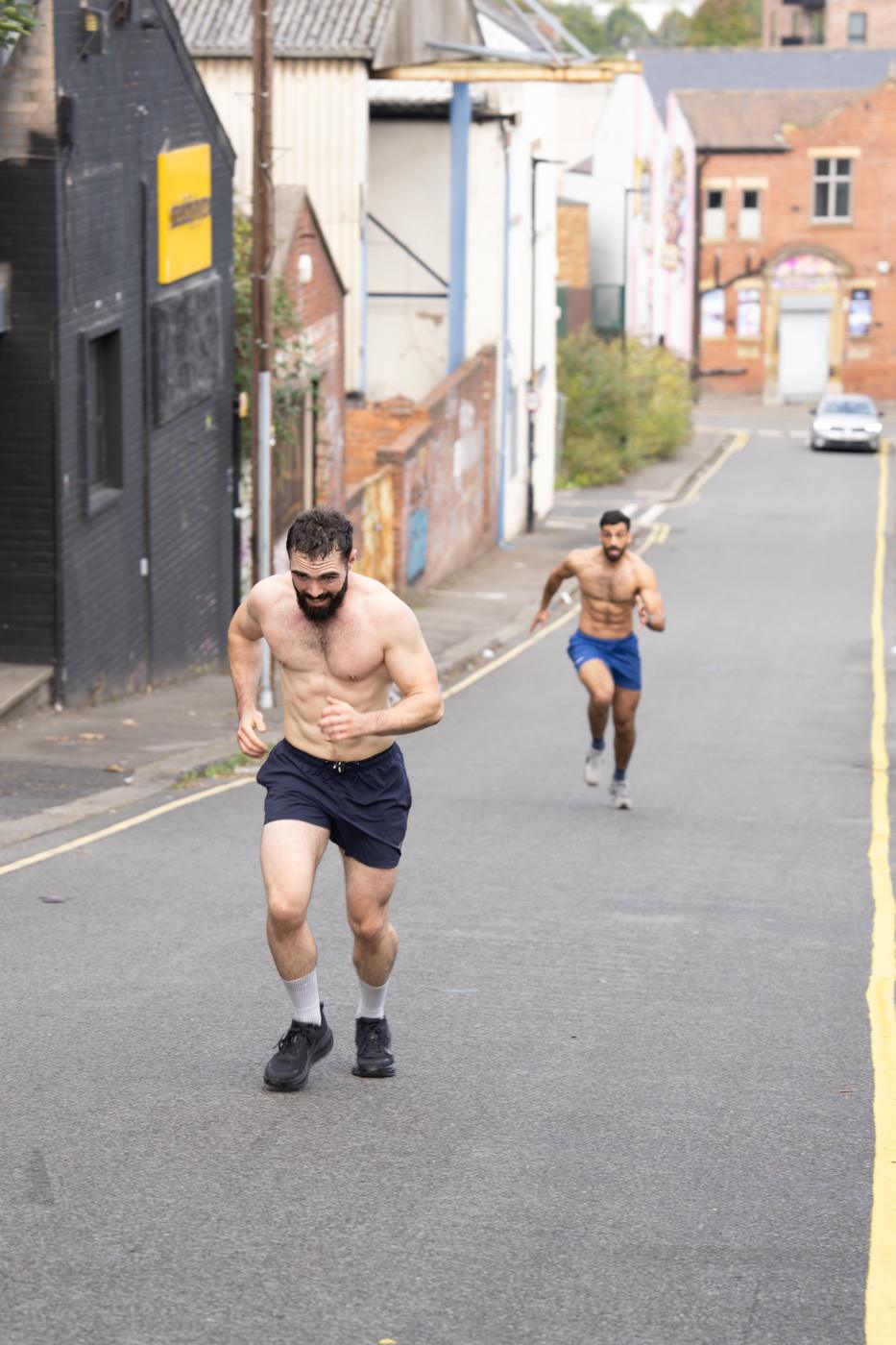 Outdoor sprint finisher on the street outside the gym