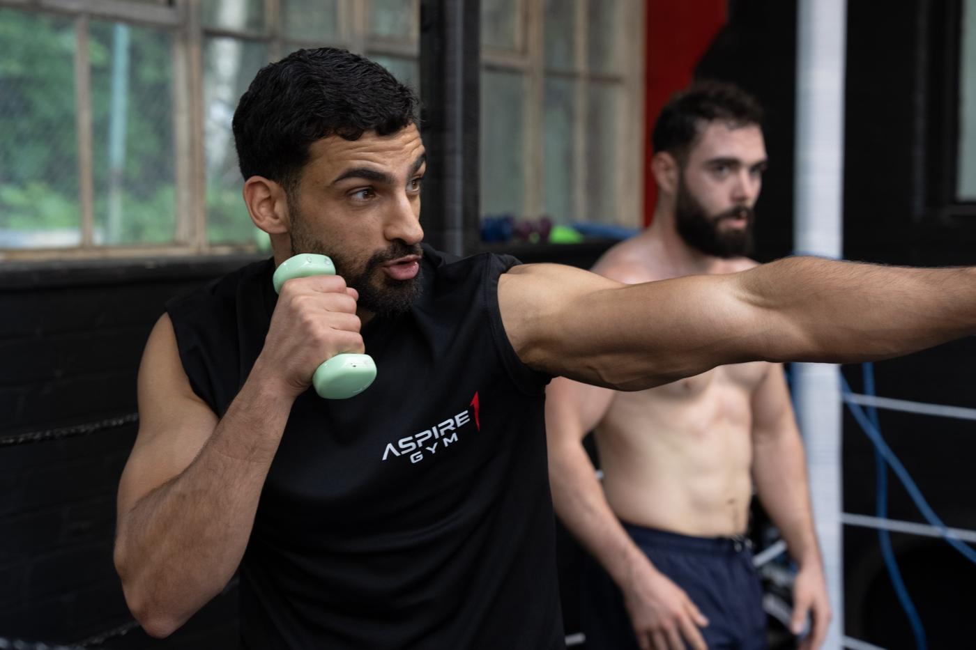 Shadow boxing with light dumbbells
